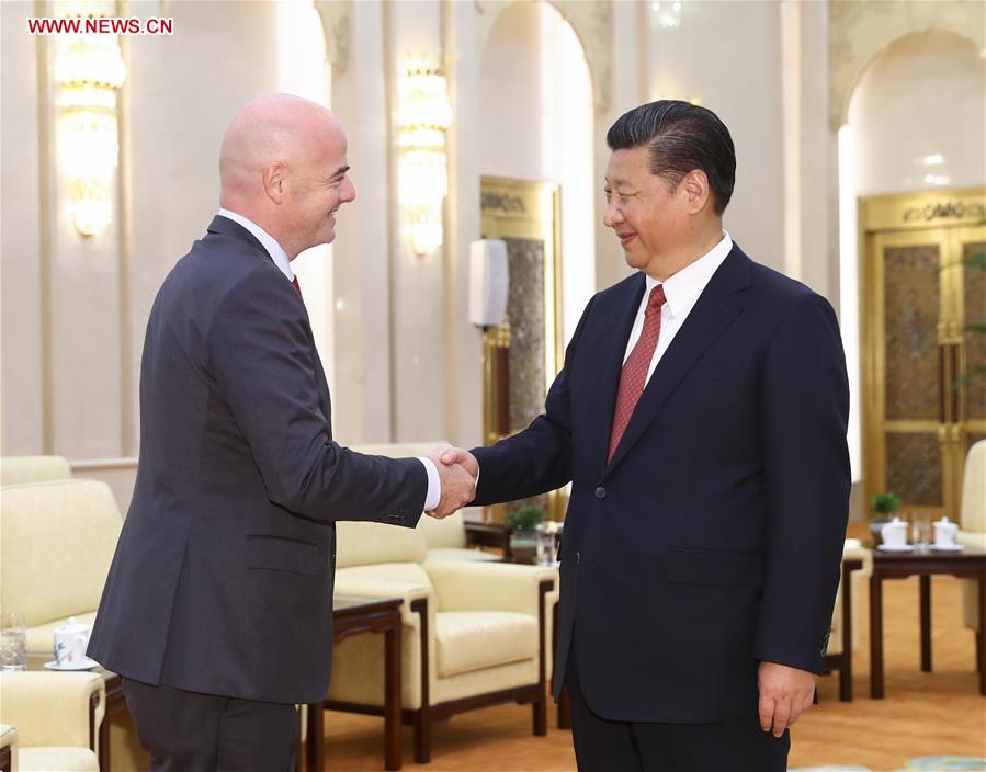 习近平会见国际足联主席 谈足球运动的真谛